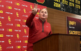USC defensive coordinator Gary Patterson flashes a fight on during his introductory press conference