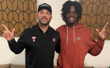 Lawrence Britt with Texas Tech WR's coach Juice Johnson