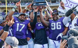 TCU Horned Frogs quarterback Trevone Boykin (2) and safety Sam Carter (17) and defensive tackle Chucky Hunter (96) hold up the Big 12 championship trophy after the game against the Iowa State Cyclones at Amon G. Carter Stadium