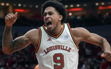 Louisville Cardinals forward Khani Rooths (9) celebrates slamming the ball home for two against SMU Saturday at the KFC Yum! Center. Jan. 31, 2026