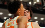 Tennessee forwards Nate Ament (10) and J.P. Estrella (13) celebrate after Ament drew a foul and scored during an NCAA college basketball game against Ole Miss on February 3, 2026, in Knoxville, Tennessee.
