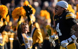 Iowa Hawkeyes defensive back Koen Entringer (4) runs onto the field during senior recognition Nov. 22, 2025 at Kinnick Stadium in Iowa City, Iowa.