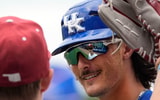 May 20, 2025; Hoover, AL, USA; Oklahoma player Sam Christiansen is reflected in the sunglasses of Kentucky first base coach Jaxon Jelkin in the first round of the SEC Baseball Tournament at the Hoover Met. (© Gary Cosby Jr. / USA TODAY NETWORK via Imagn Images)