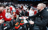 Louisville Cardinals head coach Pat Kelsey signed a fan's Adidas shoe after the Cards beat NC State in ACC basketball February 9, 2026 in Louisville, Kentucky.© Matt Stone/Courier Journal / USA TODAY NETWORK via Imagn Images