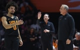 Feb 14, 2026; Knoxville, Tennessee, USA;  Tennessee Volunteers head coach Rick Barnes speaks with guard Ja'kobi Gillespie (0) during the first half against the Louisiana State Tigers at Thompson-Boling Arena at Food City Center. Mandatory Credit: Randy Sartin-Imagn Images