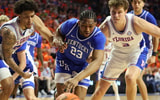 Florida guard Isaiah Brown (20), left, and Florida center Micah Handlogten (3) fight Kentucky forward Mouhamed Dioubate (23) for the rebound during the first half of a NCAA mens basketball game at Steven C. O'Connell Center Exactek arena in Gainesville, FL on Saturday, February 14, 2026. [Alan Youngblood/Gainesville Sun]