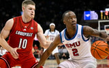 Feb 17, 2026; Dallas, Texas, USA; SMU Mustangs guard Boopie Miller (2) brings the ball up court past Louisville Cardinals guard Isaac McKneely (10) during the second half at Moody Coliseum. Mandatory Credit: Jerome Miron-Imagn Images