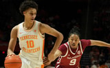 Tennessee forward Nate Ament (10) moves the ball while guarded by Oklahoma guard Nijel Pack (9) during an NCAA college basketball game on Feb. 18, 2026, in Knoxville, Tennessee.