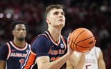 Feb 14, 2026; Fayetteville, Arkansas, USA; Auburn Tigers forward Filip Jovic (38) shoots a free throw in the second half against the Arkansas Razorbacks at Bud Walton Arena. Mandatory Credit: Nelson Chenault-Imagn Images