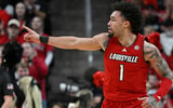 Feb 21, 2026; Louisville, Kentucky, USA; Louisville Cardinals guard J'vonne Hadley (1) reacts during the first half against the Georgia Tech Yellow Jackets at KFC Yum! Center. Mandatory Credit: Jamie Rhodes-Imagn Images