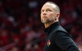 Louisville Cardinals head coach Pat Kelsey looks up at the scoreboard as the Louisville Cardinals host the Georgia Tech Yellow Jackets in an NCAA basketball game at the KFC Yum! Center, Saturday, Feb. 21, 2026, in Louisville.