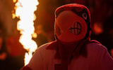 The Cardinals mascot pumps up the crowd alongside pyrotechnics during pregame introductions before the Louisville Cardinals host the Georgia Tech Yellow Jackets in an NCAA basketball game at the KFC Yum! Center on Saturday, Feb. 21, 2026, in Louisville.