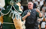 Michigan State's new football coach Pat Fitzgerald addresses the crowd during a timeout in the first half of the Spartans basketball game against Iowa on Tuesday, Dec. 2, 2025, at the Breslin Center. - Nick King, USA TODAY Sports