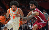 Tennessee guard Ja'Kobi Gillespie (0) dribbles the ball around Alabama guard Houston Mallette (95) during a NCAA basketball game between Tennessee and Alabama at Thompson-Boling Arena at Food City Center in Knoxville, Tenn., on Feb. 28, 2026.