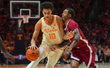 Tennessee forward Nate Ament (10) dribbles the ball past Alabama guard Labaron Philon Jr. (0) during a NCAA basketball game between Tennessee and Alabama at Thompson-Boling Arena at Food City Center in Knoxville, Tenn., on Feb. 28, 2026.