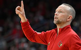 Mar 3, 2026; Louisville, Kentucky, USA; Louisville Cardinals head coach Pat Kelsey calls out instructions during the first half agains the Syracuse Orange at KFC Yum! Center. Mandatory Credit: Jamie Rhodes-Imagn Images