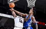 Kentucky SG Otega Oweh contests a shot at Texas AM, via Maria Lysaker-Imagn Images