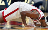 Mar 3, 2026; Louisville, Kentucky, USA; Louisville Cardinals guard Ryan Conwell (3) kisses the floor as winds down in the second half against the Syracuse Orange at KFC Yum! Center. Louisville defeated Syracuse 77-62. Mandatory Credit: Jamie Rhodes-Imagn Images