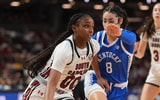 South Carolina Gamecocks guard Ta'niya Latson (00) goes to the basket defended by Kentucky Wildcats guard Asia Boone (8) during the second half at Bon Secours Wellness Arena. Mandatory Credit: Jim Dedmon-Imagn Images