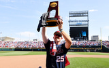 tim-elko-brings-out-cws-trophy-to-celebrate-with-ole-miss-fans