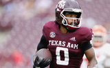 ainias-smith-needs-help-off-field-after-painful-leg-injury-against-arkansas