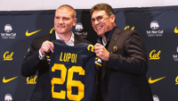 Tosh Lupoi and Ron Rivera