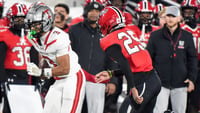 Thompson's wide receiver Darion Moseley (3) carries against Opelika defensive back Jamel Griffin (25) during their AHSAA 7A Football State Championship game in Birmingham, Ala. on Wednesday December 3, 2025. © Mickey Welsh / Advertiser / USA TODAY NETWORK via Imagn Images
