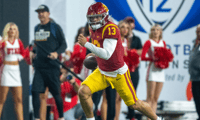 Caleb Williams #13 of USC runs downfield during a game between the USC Trojans and the Utah Utes at Allegiant Stadium on December 2, 2022 in Las Vegas, Nevada. (Photo by Jason Allen/ISI Photos/Getty Images)