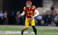 Caleb Williams #13 of the USC Trojans looks to throw against the Tulane Green Wave in the first half of the Goodyear Cotton Bowl Classic on January 2, 2023 at AT&T Stadium in Arlington, Texas. (Photo by Ron Jenkins/Getty Images)