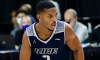 rice-guard-hits-buzzer-beater-hilariously-celebrates-with-fans-travis-evee
