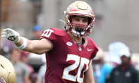 Sophomore linebacker Blake Nichelson makes a call during the Florida State spring showcase. (Ben Spicer/Warchant)