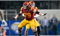 USC Trojans offensive lineman Jonah Monheim (79) in action during the game between the USC Trojans and the Tulane Green Wave in the 2023 Cotton Bowl at AT&T Stadium