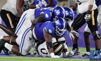 Kentucky defense stuffs a run, Dr. Michael Huang, KSR