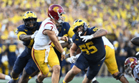 Michigan Wolverines football junior defensive tackles Kenneth Grant (left) and Mason Graham (right) each had a sack on USC quarterback Miller Moss. (Photo by Lon Horwedel / TheWolverine.com)