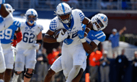 Oct 1, 2022; Oxford, Mississippi, USA; Kentucky Wildcats tight end Jordan Dingle (85) and Mississippi Rebels defensive back Davison Igbinosun (20) during the second half at Vaught-Hemingway Stadium. Mandatory Credit: Petre Thomas-Imagn Images