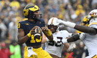 Michigan Wolverines football quarterback Alex Orji had a touchdown pass to Tyler Morris in a win over Minnesota. (Photo by Lon Horwedel / TheWolverine.com)