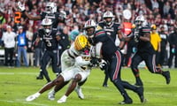 South Carolina running back Rocket Sanders running through Missouri defenders on his way to the end zone for the game-winning touchdown. Photo by: Katie Dugan | GamecockCentral