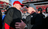 Louisville''s Jeff Brohm and Kentucky head coach Mark Stoops after the Governor's Cup,