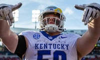 Kentucky lineman Koby Keenum (50) taunted the home crowd after Kentucky defeated Louisville 38-31 on Saturday afternoon at L&N Stadium in Louisville, Ky. Nov. 25, 2023. (© Jeff Faughender/Courier Journal / USA TODAY NETWORK)