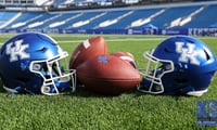 Kentucky footballs and helmets at Kroger Field on Media Day - Dr. Michael Huang, Kentucky Sports Radio