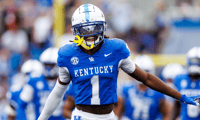Sep 21, 2024; Lexington, Kentucky, USA; Kentucky Wildcats defensive back Maxwell Hairston (1) runs onto the field before the game against the Ohio Bobcats at Kroger Field. Mandatory Credit: Jordan Prather-Imagn Images