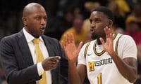 Feb 25, 2025; Columbia, Missouri, USA; Missouri Tigers head coach Dennis Gates talks with guard Marques Warrick (1) against the South Carolina Gamecocks during the second half at Mizzou Arena. Mandatory Credit: Denny Medley-Imagn Images