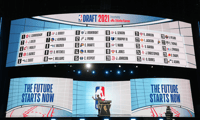 Adam Silver on the stage at the NBA Draft, via Brad Penner-Imagn Images