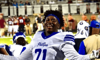 Four-star OT Claude Mpouma
