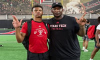 Isaiah Rasheed with Texas Tech Director of Player Personnel Brian Nance