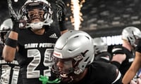 St. Peter's Prep players get ready for a New Jersey high school football game against Don Bosco Prep.