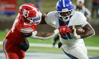 McCallie running back Keylan Syam runs in a Tennessee high school football game.