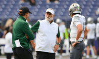 Sep 7, 2024; Seattle, Washington, USA; Eastern Michigan Eagles head coach Chris Creighton during team warmups before the game against the Washington Huskies at Alaska Airlines Field at Husky Stadium. Mandatory Credit: Steven Bisig-Imagn Images