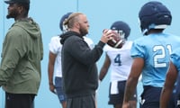 UNC defensive coordinator Steve Belichick and inside linebackers coach Jamie Collins