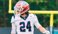 2027 linebacker Trace Washington from Woodstock, Georgia